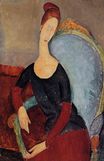 Amedeo Modigliani - Portrait of Jeanne Hebuterne in a Blue Chair 1918