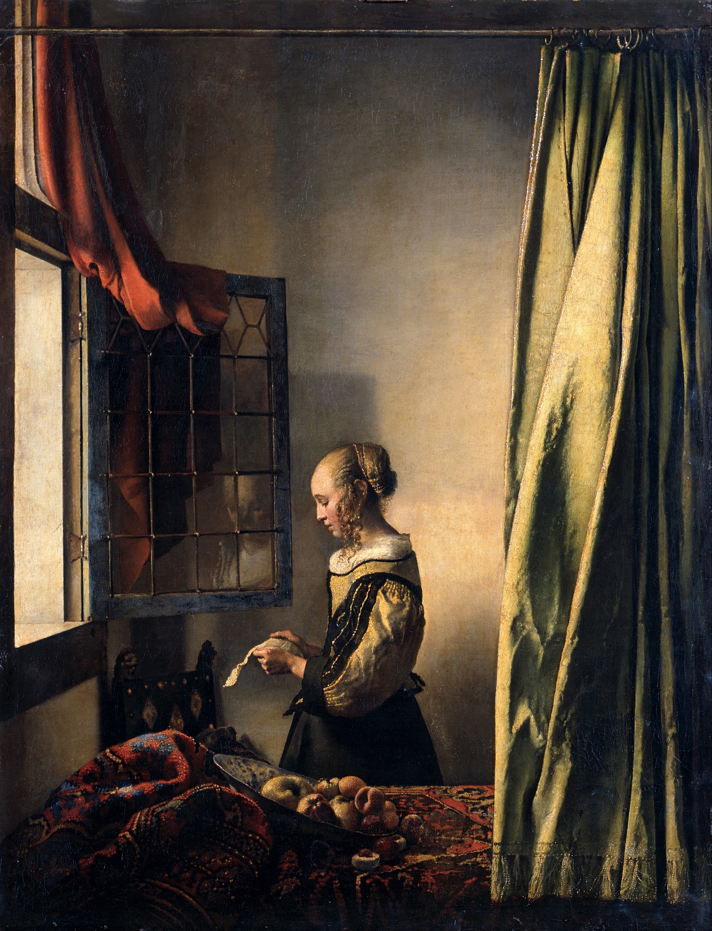 Johannes Vermeer - Girl Reading a Letter at an Open Window 1657