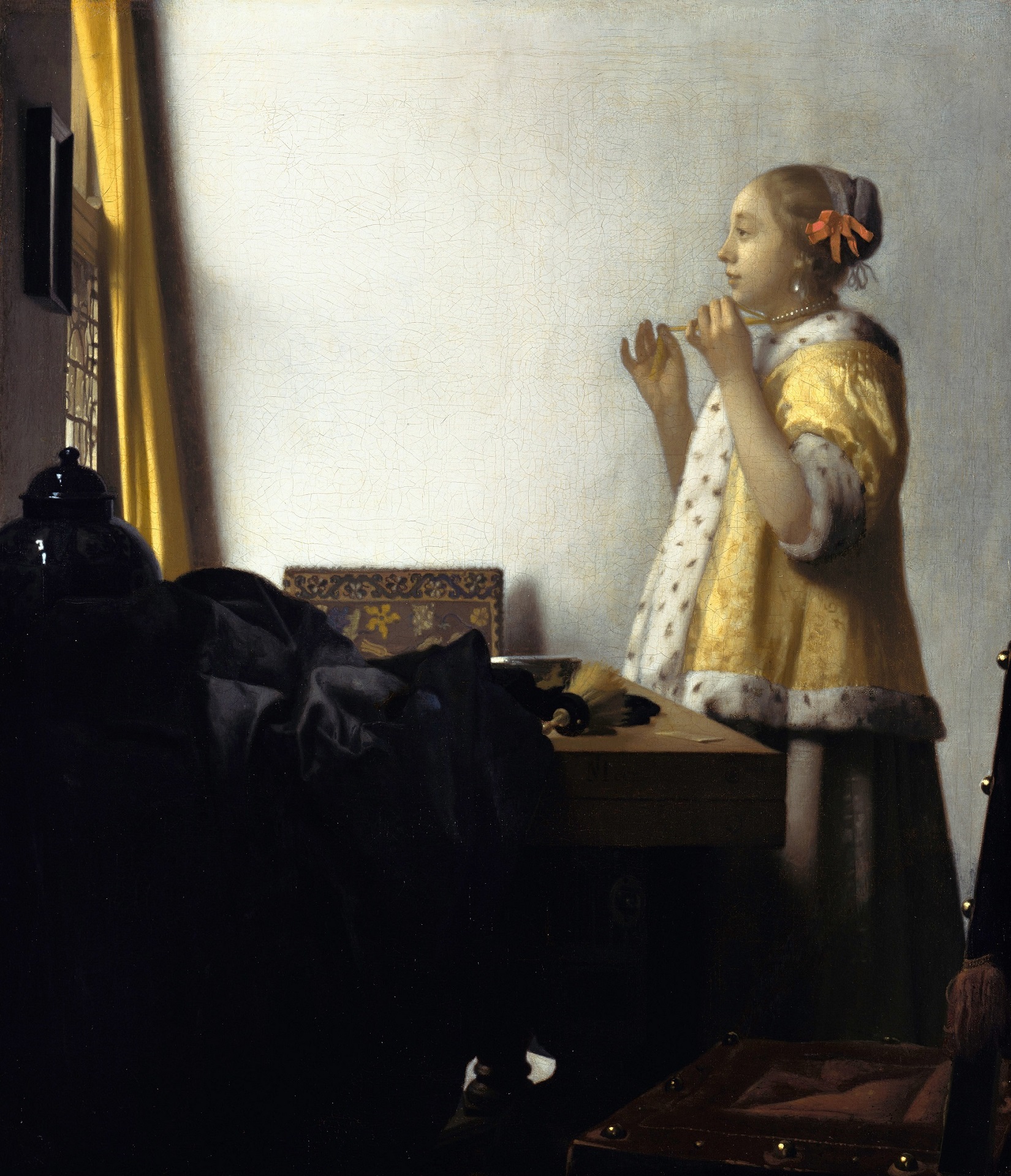 Johannes Vermeer - Young Woman with a Pearl Necklace 1662