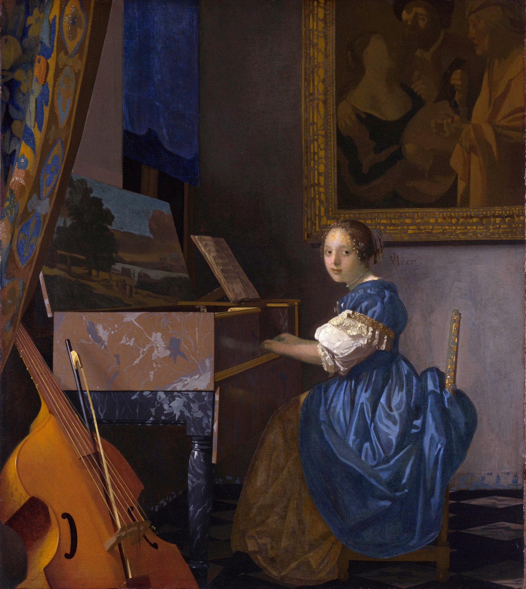 Johannes Vermeer - A young woman seated at a virginal. A Lady Seated at a Virginal 1670-1672