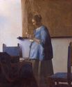 Johannes Vermeer - Woman reading a letter. Woman in Blue Reading a Letter 1662-1663